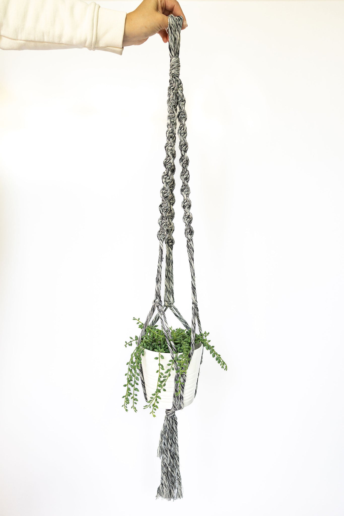 black and white macrame plant hanger Black and white macrame plant hanger